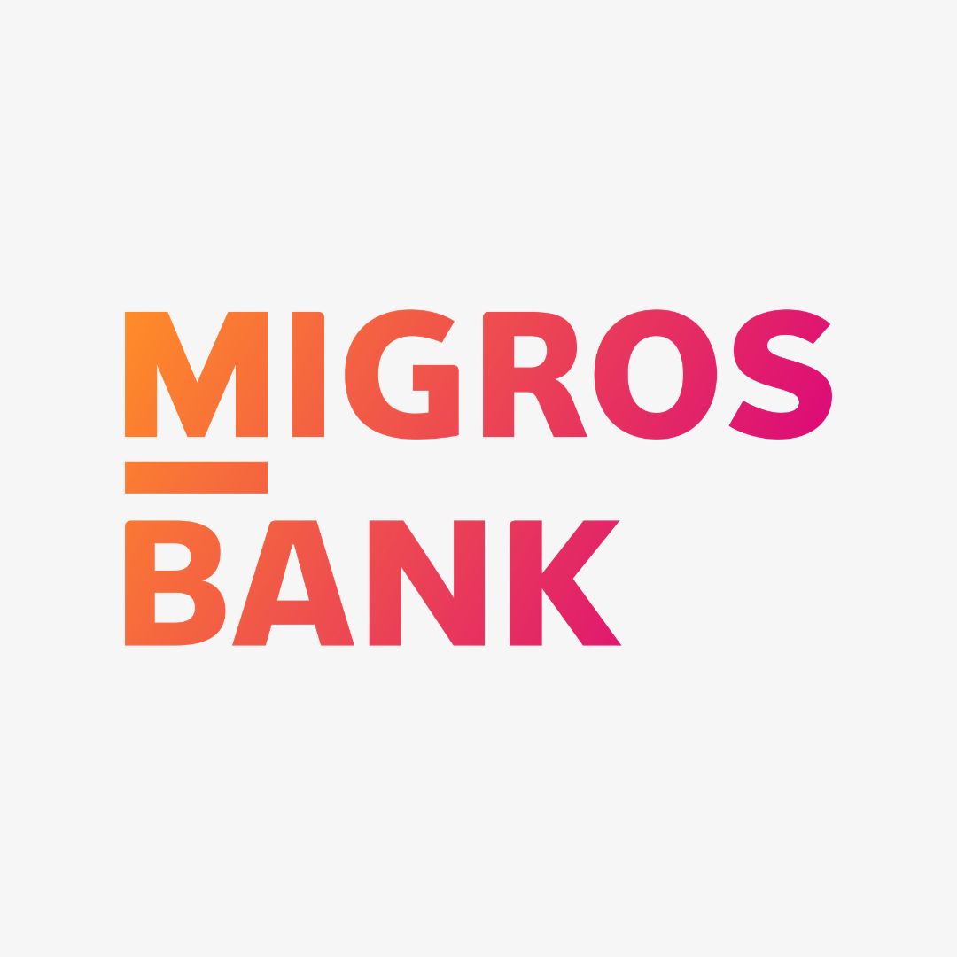 Migros Bank Logo auf hellgrauem Hintergrund
